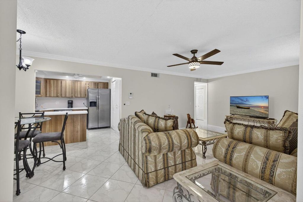 Photo of 309 Knotty Pine Circle #D-1, Greenacres, FL 33463 (MLS # R11134015)