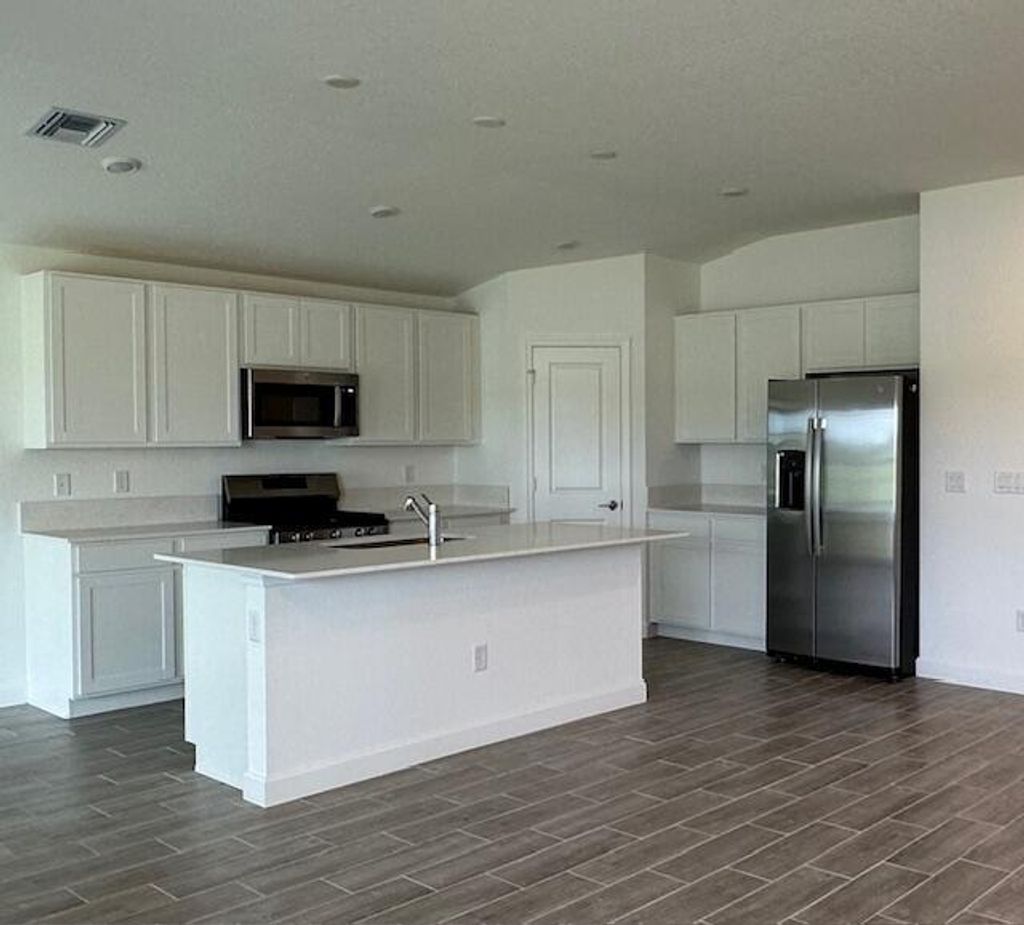 Photo of 6314 NW Windwood Way, Port Saint Lucie, FL 34987 (MLS # R11021193)