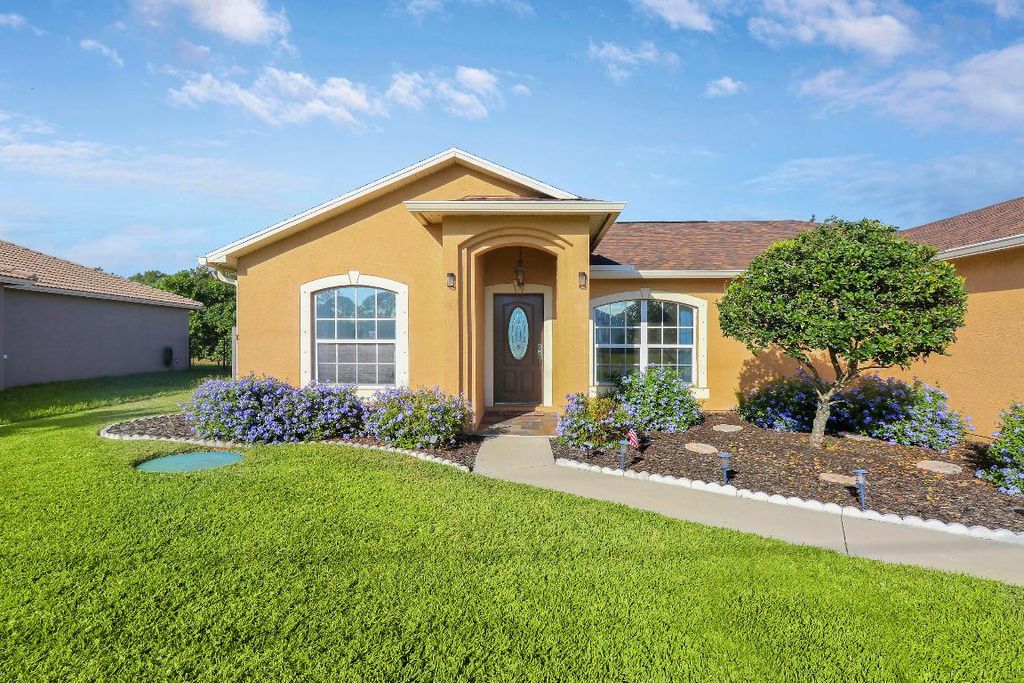 Photo of 5867 NW Zenith Drive, Port Saint Lucie, FL 34986 (MLS # R10935529)