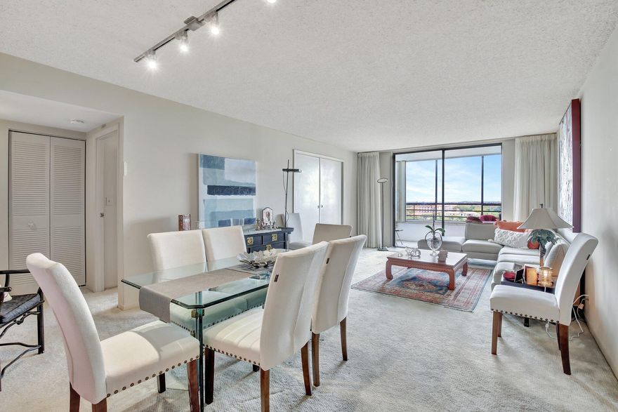 Discover Olympus 600 Tower in Hallandale Beach! This beautifully maintained 2BR/2BA condo sits on the 8th floor, offering sweeping city views from a private covered balcony. Inside, a bright split-bedroom floor plan showcases a spacious great room, tile and carpet flooring, and impact glass for peace of mind. The large master suite features a walk-in closet and ample space to retreat, while the guest room is perfectly positioned for privacy. Enjoy a fully equipped kitchen with appliances and central A/C. Added comforts include elevator access, secure lobby entry, and an attached 1-car garage. Perfectly located east of US-1, just minutes from the beach, dining, and shopping--this move-in ready home combines style, security, and an unbeatable location. Being Sold Fully Furnished!