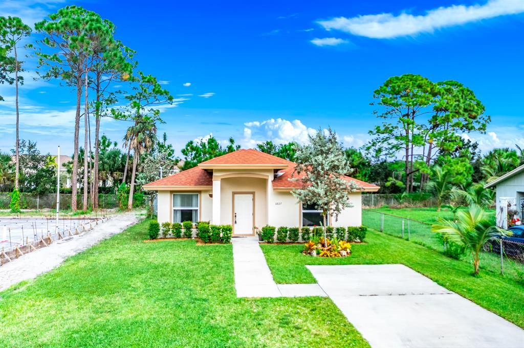 Photo of 6827 Australian Street, Jupiter, FL 33458 (MLS # R10754247)