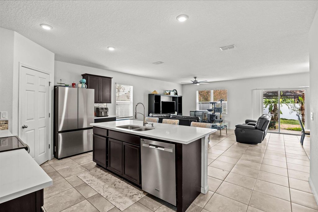 Photo of 1749 SW Alberca Lane, Port Saint Lucie, FL 34953 (MLS # B26011804)