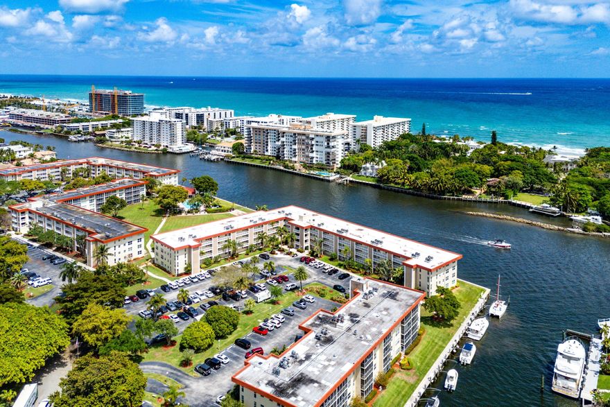 Enjoy Waterfront Living and The Views from this Top Floor Corner Unit.  Located in a Beautiful 17 acre Oasis right on the Intracoastal situated between the Hillsboro and Boca Raton Inlets with Resort Style Heated Pool.  This Corner unit has been freshly updated with LVP flooring and painted throughout.  Other updates include Impact Windows and Doors, Granite Kitchen and Baths, New Refrigerator, New remote Fans and Fixtures. Unit boasts a large screened Balcony Overlooking the Intracoastal and tons of closet and storage space. Maintenance fee includes wi-fi, cable, water/trash and more.  Boat Dockage $3/ft when available.