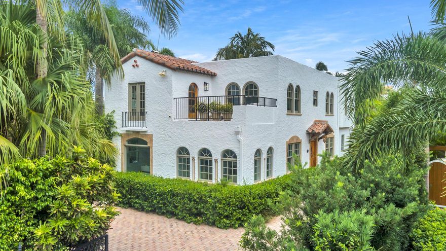 'Villa Valencia' in the lake block of El Cid is situated on an estate sized lot. This Spanish style home features 3 or 4BR/4.5BTH w/pool, garage & 1/1 guest casita. 1920s architectural details with modern finishes, bright grand entry, large formal living room with original mantel & prominent garden views, arched windowed sunroom & den. Sparkling kitchen with gas cooktop, large island, SS appliances & breakfast room. Gorgeous bright family room, large windows & built-ins, Primary bedroom suite boasts den, terrace, closets & spa inspired bath with double vanities, soaking tub & shower. 2/3 additional upstairs bedrooms are possible plus 2 guest baths. Charming 1/1 guest cottage with living room & kitchen. Expansive private yard, koi pond, pool & spa surrounded by mature tropical landscaping.