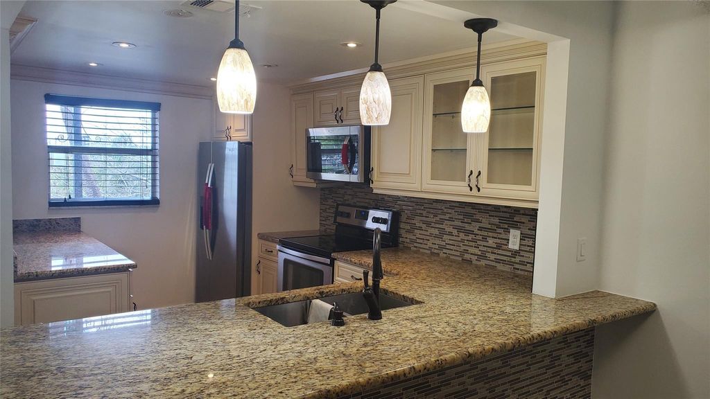 Photo of 10110 Boca Entrada Boulevard #302, Boca Raton, FL 33428 (MLS # F10534380)