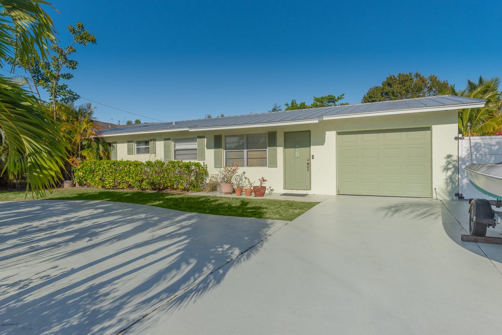 Photo of 1743 NE 24th Street, Jensen Beach, FL 34957 (MLS # R11053188)