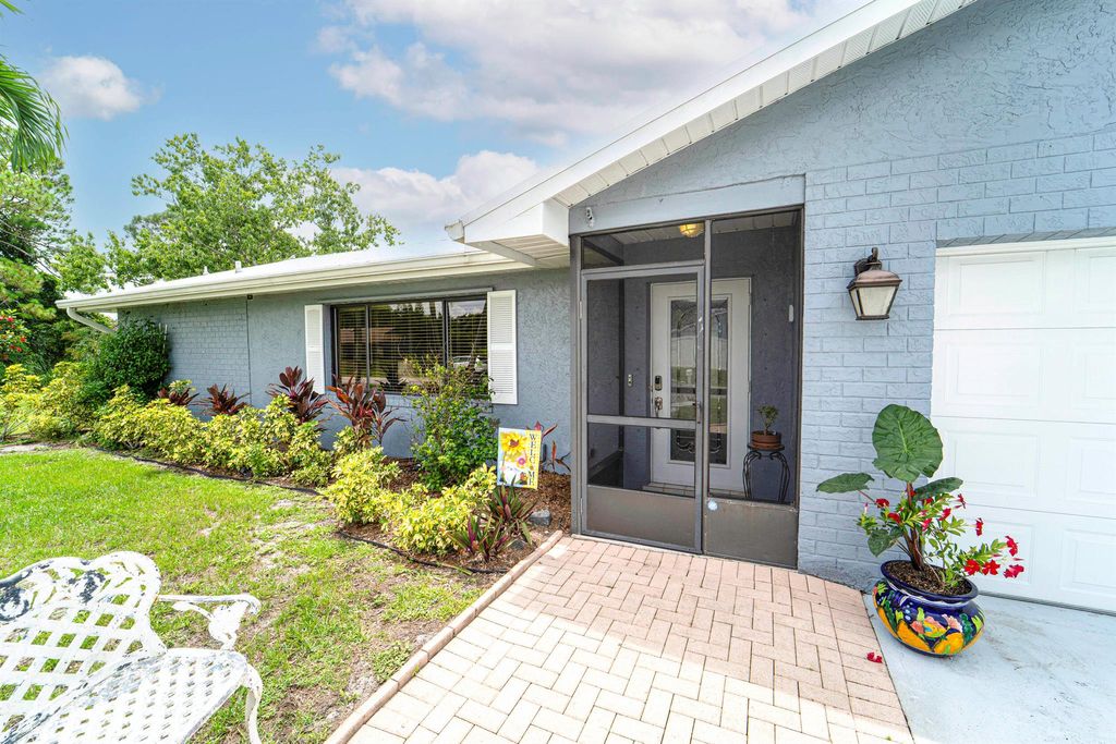 Photo of 392 SW Molloy Street, Port Saint Lucie, FL 34984 (MLS # R11106522)