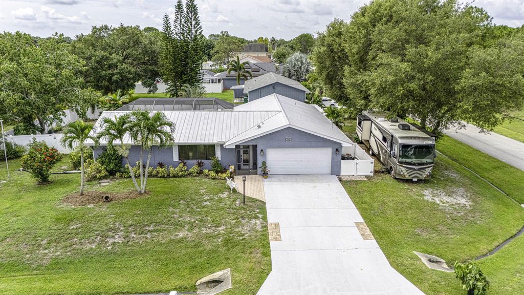 Photo of 392 SW Molloy Street, Port Saint Lucie, FL 34984 (MLS # R11106522)