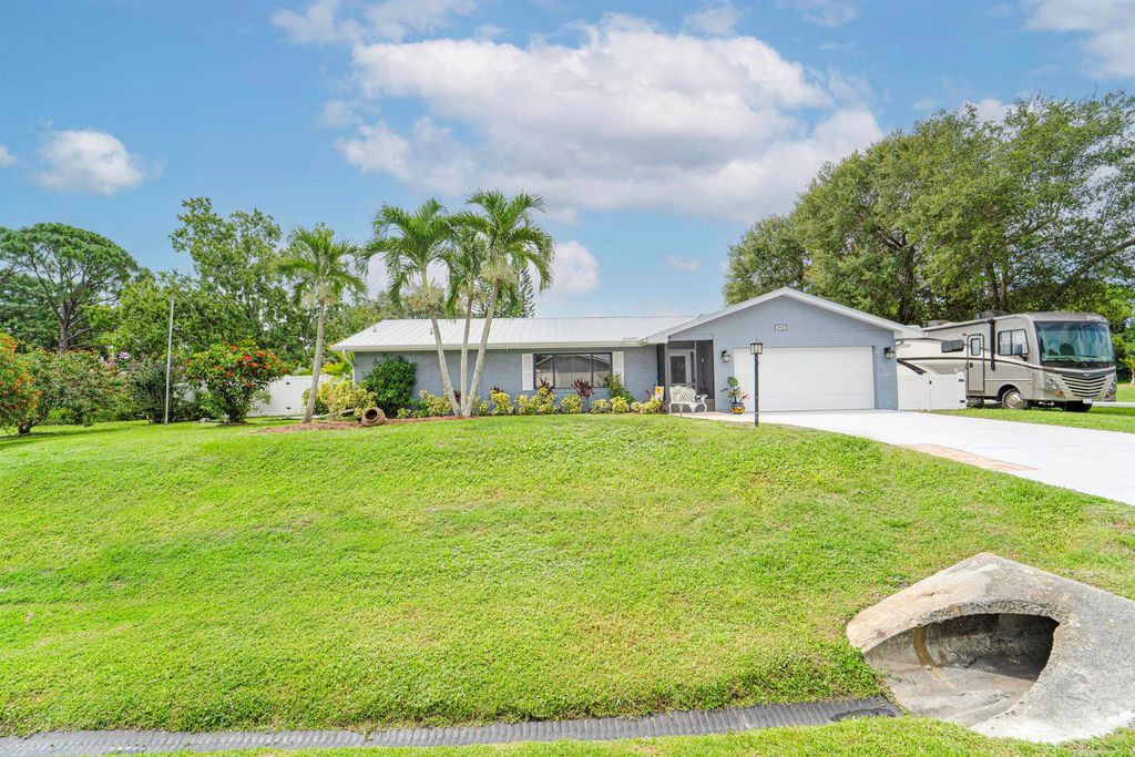 Photo of 392 SW Molloy Street, Port Saint Lucie, FL 34984 (MLS # R11106522)