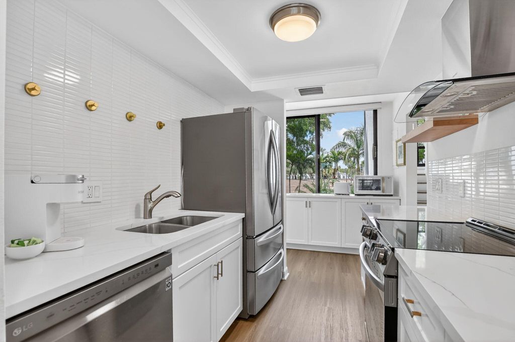 Photo of 3310 Bridgewood Drive, Boca Raton, FL 33434 (MLS # B26020225)