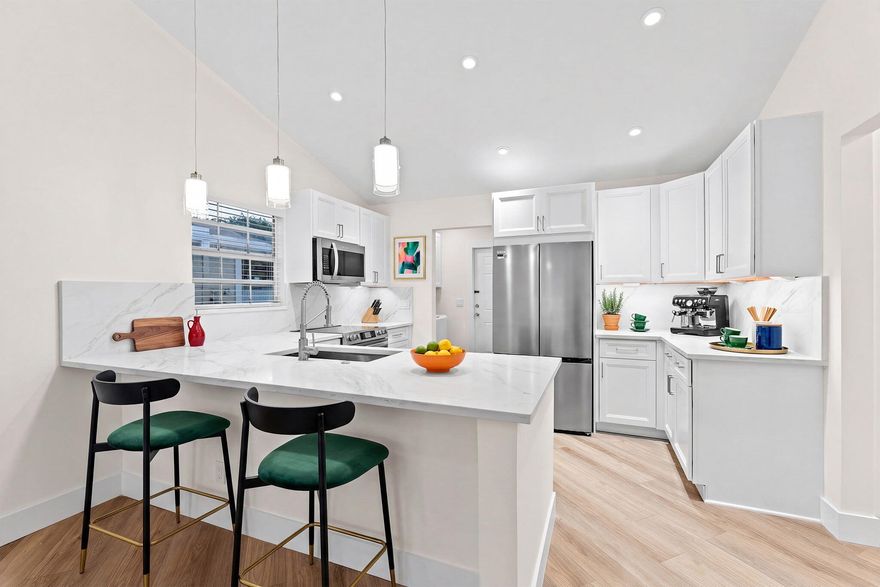 FHA OK!! Welcome to 1658 Royal Forest Court, a completely reimagined townhouse with jaw-dropping finishes and designer touches at every turn. Simply put, there is nothing else like this on the market in West Palm Beach.   This stunning 2-bedroom, 2-bathroom residence offers approximately 1,100 square feet under air, thoughtfully redesigned with impeccable attention to detail. From the moment you step inside, you'll be captivated by the custom lighting throughout - absolutely to die for - the elevated finishes that make every space feel modern, warm, and luxurious.   The open, stylish interior is perfect for both everyday living and entertaining, while the flawless renovation means nothing to do but move in and enjoy. 1 year warranty on remodel work completed. Hablamos Espanol. = Location, Location, Location  Perfectly situated just minutes from Palm Beach International Airport, Palm Beach Island, downtown West Palm Beach, and CityPlace, you'll be surrounded by the area's best dining, shopping, entertainment, and cultural venues.  * Community Perks   " Resort-style community pool   " Dog-friendly neighborhood   " Beautifully maintained common areas   " Peaceful townhome living with unbeatable convenience   Whether you're looking for a primary residence, second home, or a stylish retreat close to everything, 1658 Royal Forest Court is a rare opportunity to own a truly one-of-a-kind property.  Must own the property for 2 years before renting.   (OWNER/AGENT )