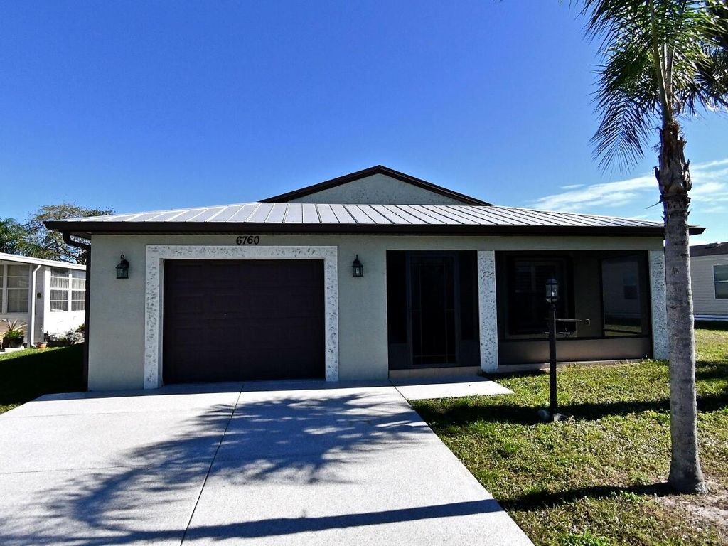 Photo of 6760 Dulce Real Real, Fort Pierce, FL 34951 (MLS # R10940901)