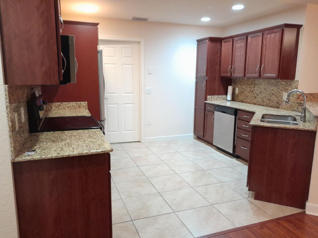 Photo of 6760 Dulce Real Real, Fort Pierce, FL 34951 (MLS # R10940901)