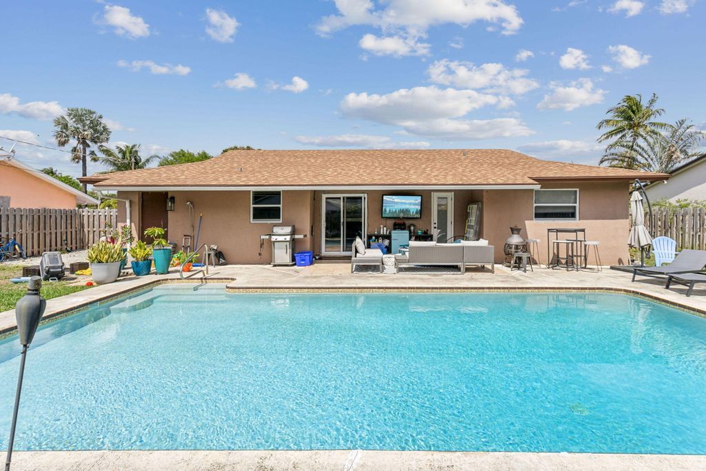 Photo of 3466 Gondolier Way, Lake Worth, FL 33462 (MLS # R10968864)