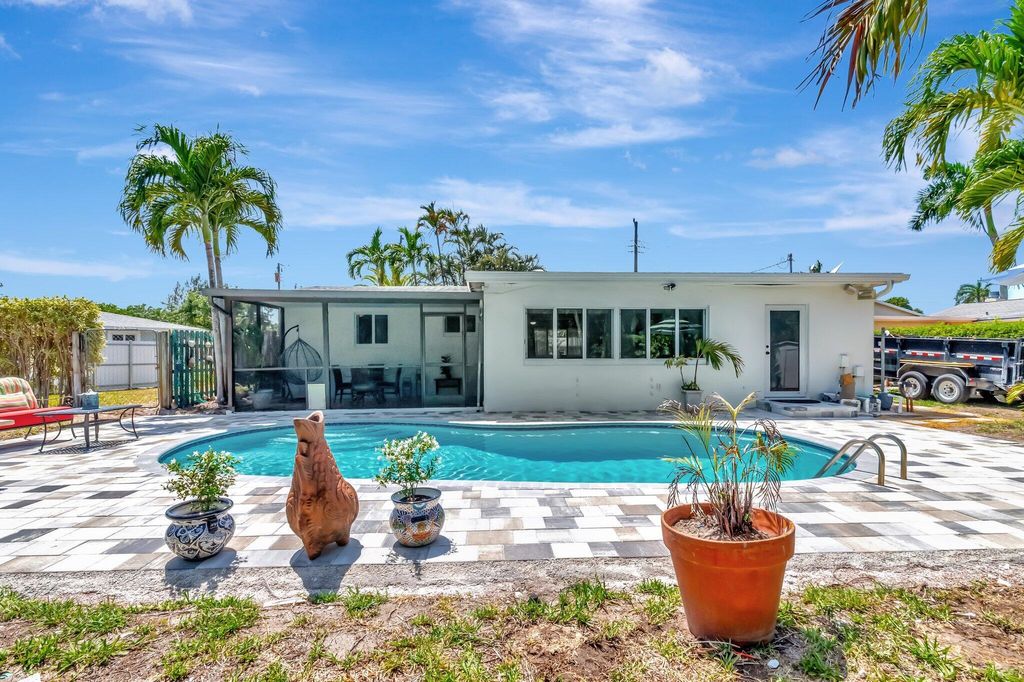 Photo of 1466 Rose Circle, West Palm Beach, FL 33406 (MLS # R11089078)