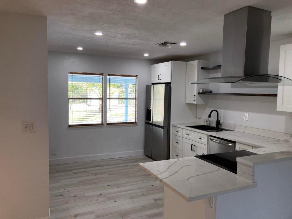 Photo of 209 Coventry Street, Boca Raton, FL 33487 (MLS # R11103521)