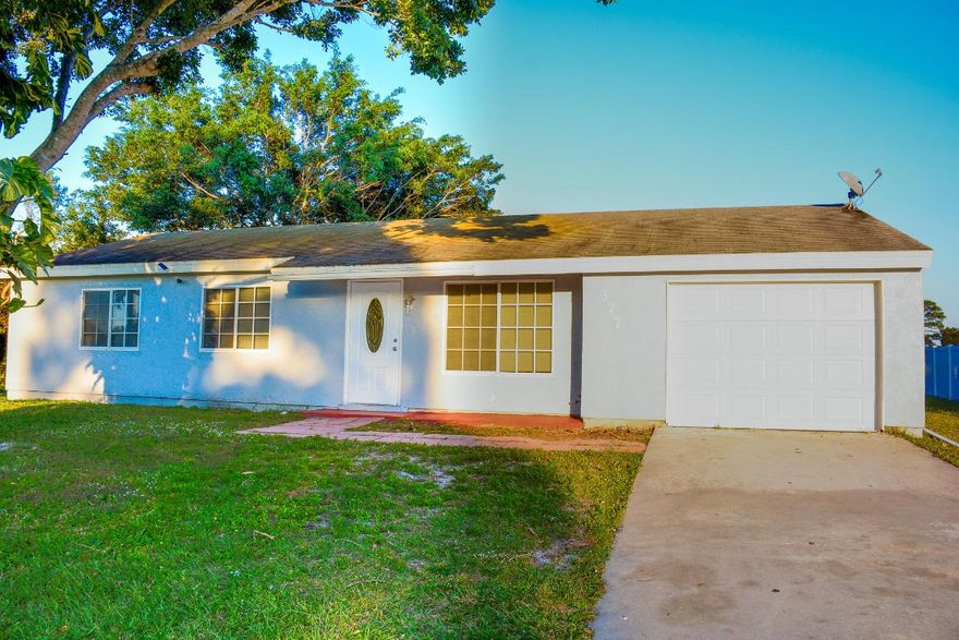 Must see this updated 3 bedroom 2 bath home located in the heart of Port St Lucie. Featuring a large living space, open updated kitchen concept along with fresh paint, NEW A/C, New water heater and updated bathrooms!!! Tenants must make 2.5- 3 times the monthly rent and provide income verification. Please apply via Rent Spree. No animals.