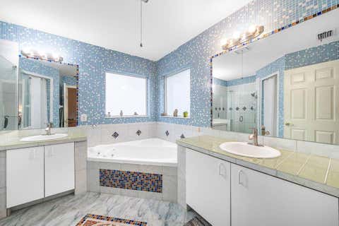 Tiny photo for 5563 NW 41st Avenue, Coconut Creek, FL 33073 (MLS # B26050658)