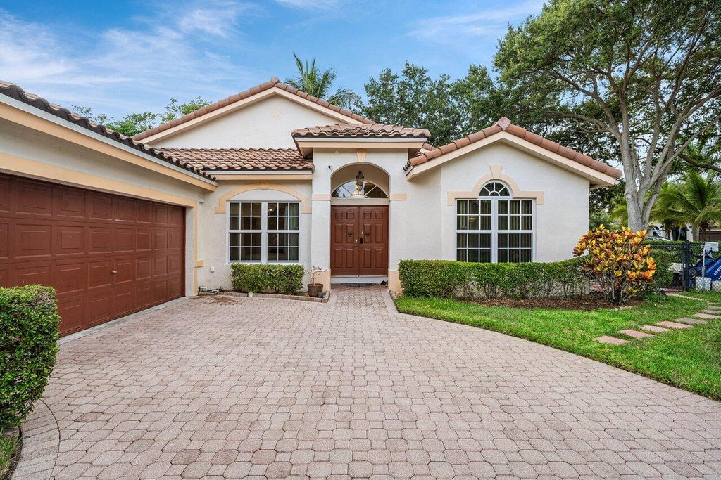 Photo of 5563 NW 41st Avenue, Coconut Creek, FL 33073 (MLS # B26050658)