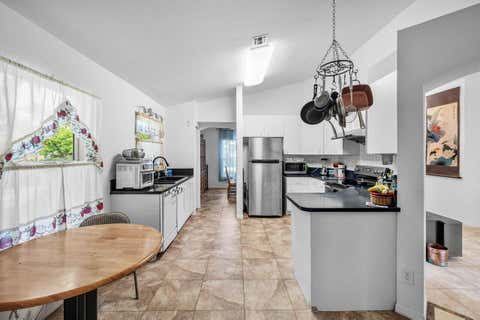 Tiny photo for 5563 NW 41st Avenue, Coconut Creek, FL 33073 (MLS # B26050658)