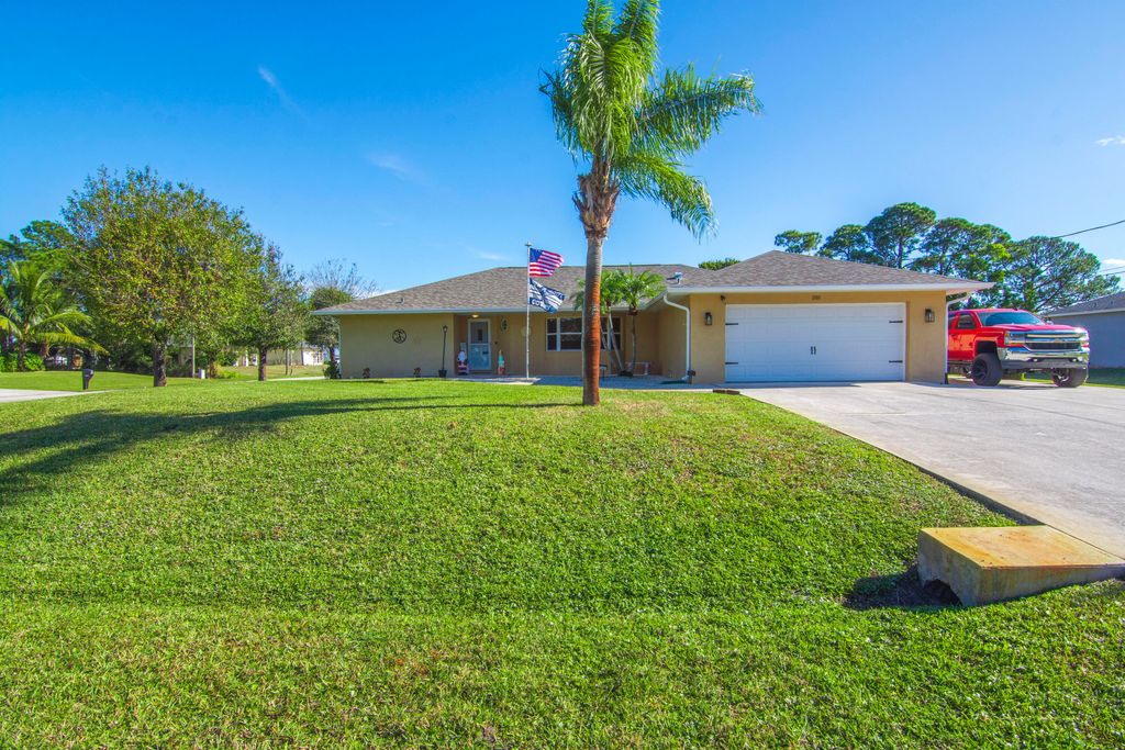 Photo of 1301 SE Nancy Lane, Port Saint Lucie, FL 34983 (MLS # R11045521)