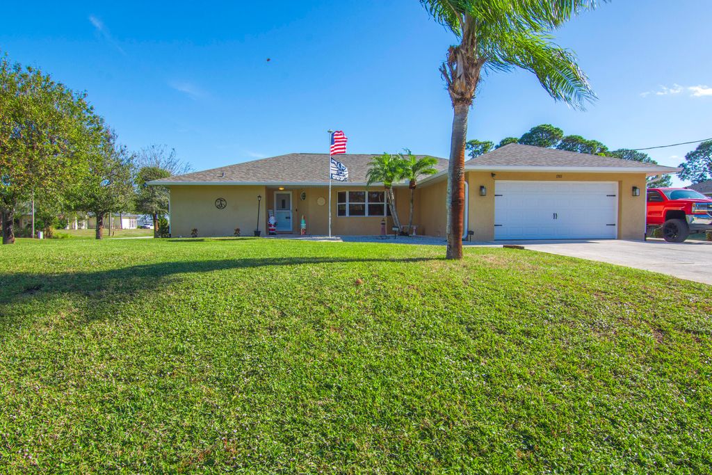 Photo of 1301 SE Nancy Lane, Port Saint Lucie, FL 34983 (MLS # R11045521)