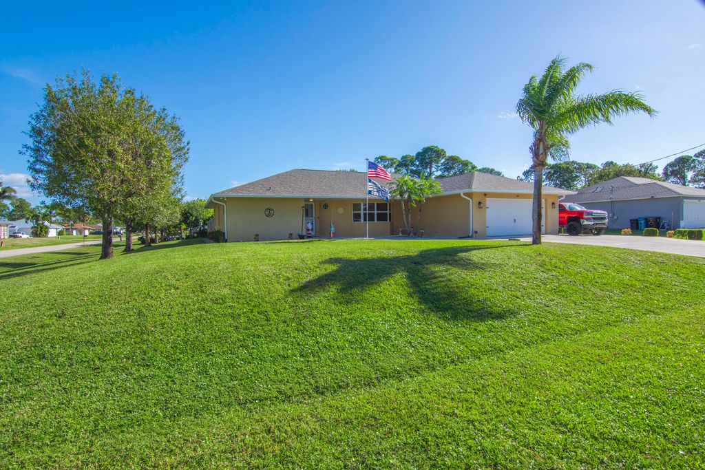 Photo of 1301 SE Nancy Lane, Port Saint Lucie, FL 34983 (MLS # R11045521)