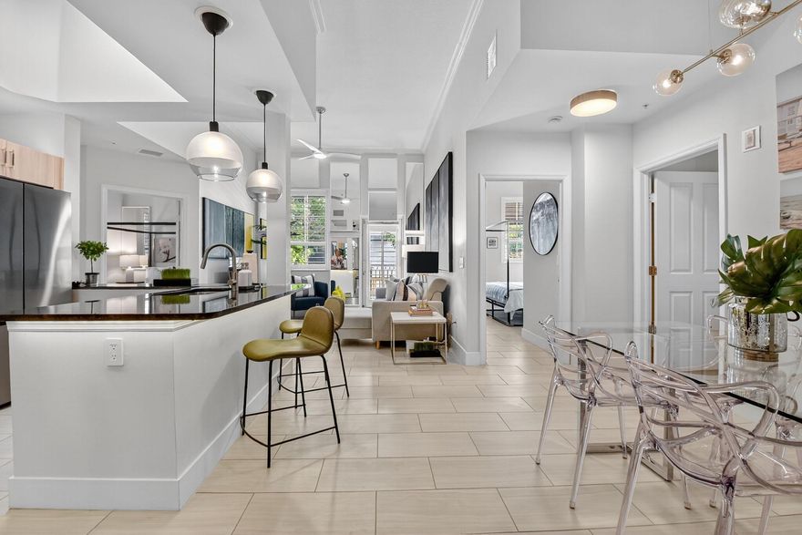 Experience life in a ''walker's paradise'' in Downtown West Palm Beach! This modern 2 bedroom/2 bathroom condo is available for annual rentals starting in Apr 2026. This is a beautiful furnished designer apartment -Turnkey. This first floor unit has walk out access to a quiet one way street. 11.5 ft ceilings and KING beds in each bedroom. Guest Bath has a soaking tub. Walk to the beach & world class dining in Palm Beach just 1 mile away and the high-speed Brightline, entertainment & shopping district at Cityplace is just two blocks. PBI is only a 10 minute drive. The Kravis Center, Norton Museum, Hive, Table 26 & Grato and all the new Class A office is within a 10 minute walk.  The Blind Monk, Loic, Canopy Rooftop & MamaBella's market are some local favorites just steps from your door.