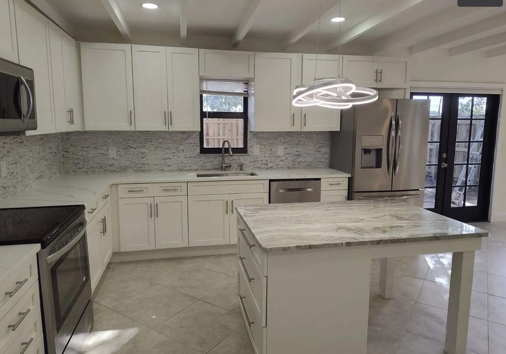 Photo of 3642 Gulfstream Road, Lake Worth Beach, FL 33461 (MLS # B26005542)