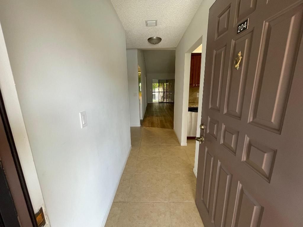 Photo of 350 Club Circle #204, Boca Raton, FL 33487 (MLS # R11090890)