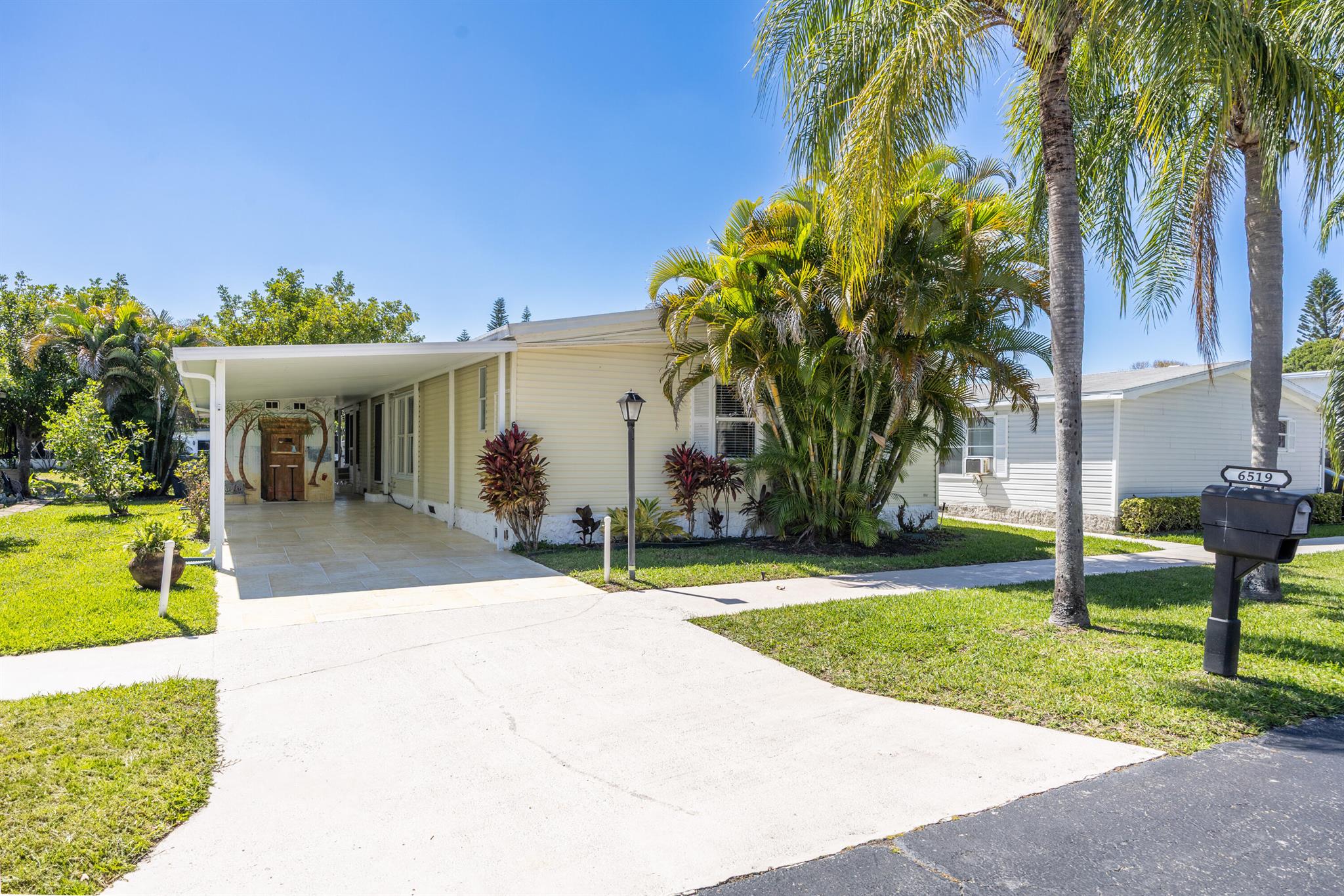 DON'T MISS THE OPPORTUNITY TO SEE THIS BEAUTIFUL HOME WITH 2 BEDROOMS, 2 BATHS, LARGE FLORIDA ROOM WITH A CANAL VIEW. LOCATED IN A 55+ COMMUNITY, THIS MOBILE HOME OFFERS GREAT COMFORT AND SERENITY. IT HAS ALL THE SPACE FOR RELAXATION AND DELIGHTFUL. THE CANAL VIEW HAS A PRIVATE DECK TO SPEND TIME WITH FAMILY AND FRIENDS. THIS MOBILE HOME WAS RENOVATED TO INCLUDE:NEW DECK MADE OF COMPOSITE BOARDS ( NO MAINTENANCE NEEDED), NEW RAILINGS, NEW CONCRETE SLAB TO LEVEL THE DECK AND DRIVEWAY, NEW SCREENING AND BLINDS IN FLORIDA ROOM, NEW STOVE, MICROWAVE, WIDE STAINLESS STEEL SINK AND FAUCET. THE EXISTING PRIVATE WATER SYSTEM TO CANAL HAS BEEN REPLACED WITH A NEW PUMP. ONLY A FEW MILES FROM THE DESIREBLE DEERFIELD BEACH, MAJOR AIRPORTS, HOSPITAL AND MORE. LOT RENTAL $1003.00 MONTHY
