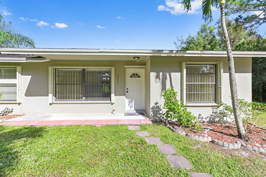 Photo of 13751 59th Court N, Loxahatchee, FL 33470 (MLS # R11147901)