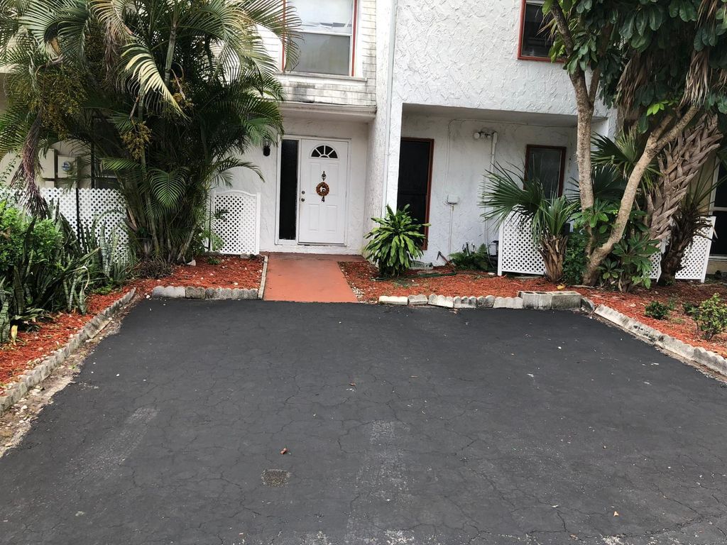 Photo of 264 Sunshine Drive, Coconut Creek, FL 33066 (MLS # B26021545)
