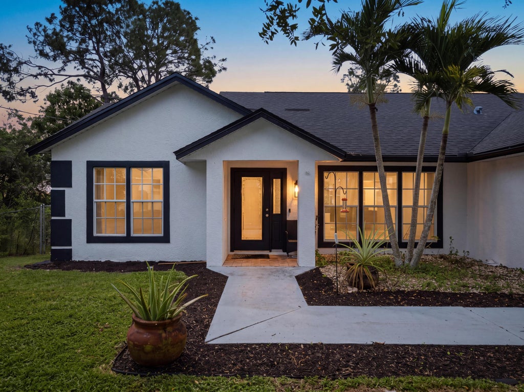 Photo of 1206 SW Emerald Avenue, Port Saint Lucie, FL 34953 (MLS # B26091530)