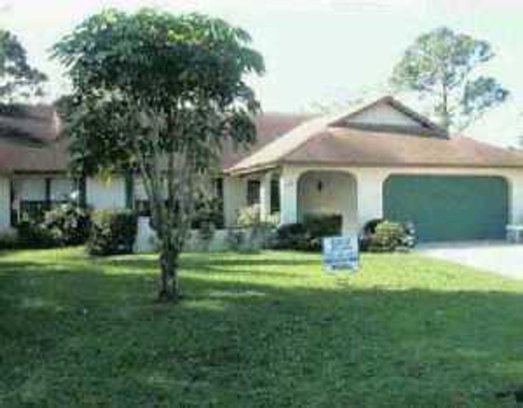 Photo of 2661 SE Opal Circle, Port Saint Lucie, FL 34952 (MLS # R10703590)