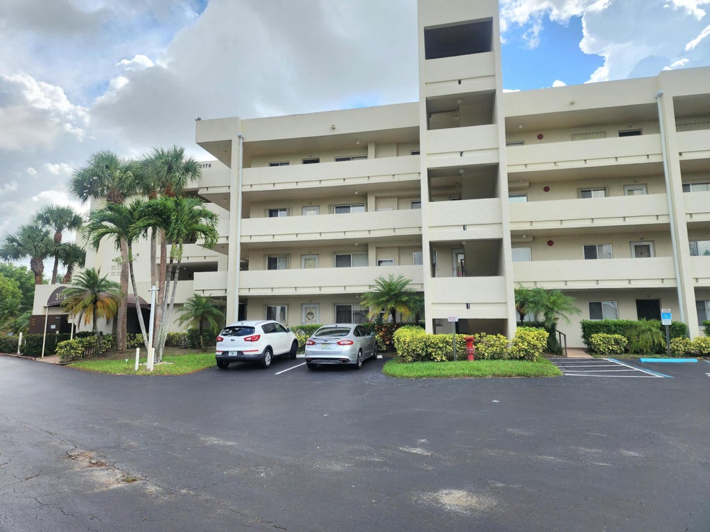 Photo of 3178 VIA POINCIANA Drive #411, Lake Worth, FL 33467 (MLS # B26072449)