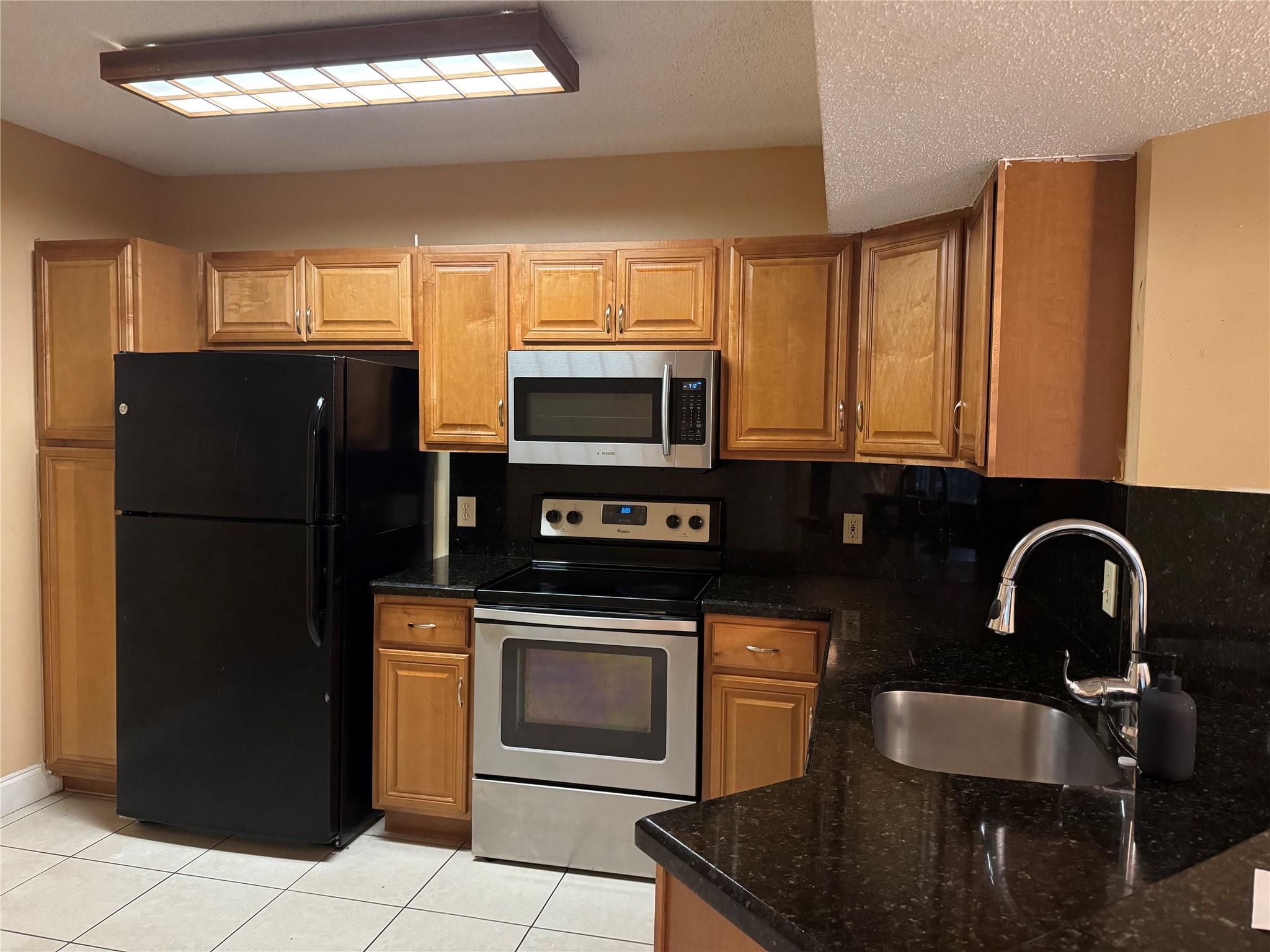 9001 Wiles Rd 305