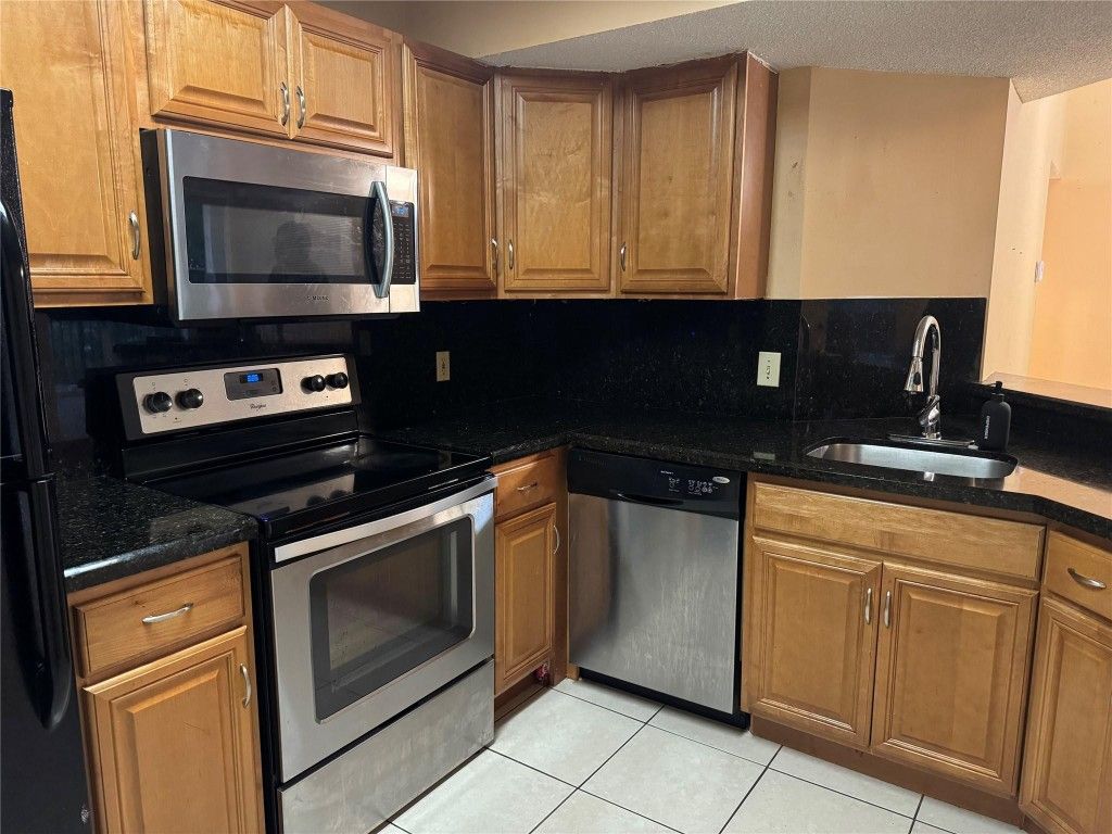 Photo of 9001 Wiles Road #305, Coral Springs, FL 33067 (MLS # F10513416)