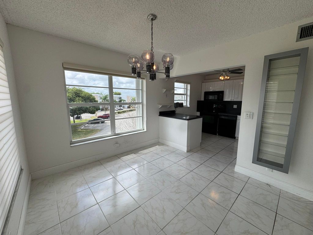 Photo of 301 Wellington F, West Palm Beach, FL 33417 (MLS # R11169889)