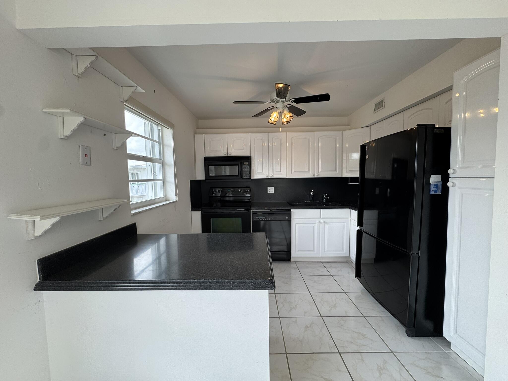 CENTURY VILLAGE - WELLINGTON CONDOS - Residential