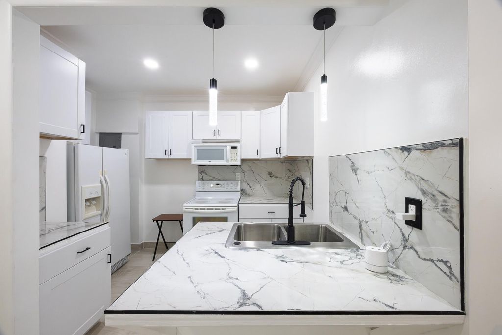 Photo of 4591 Purdy Lane #1, West Palm Beach, FL 33415 (MLS # B26009055)