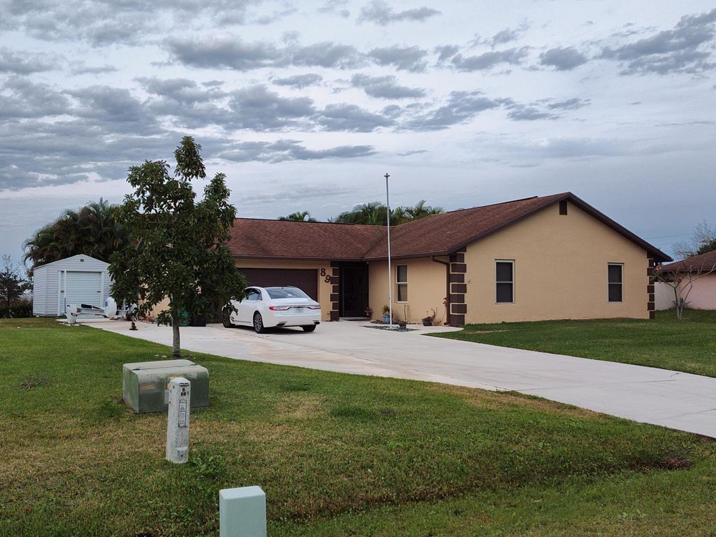 Photo of 89 Sandalwood Drive, Fort Pierce, FL 34947 (MLS # R10953804)