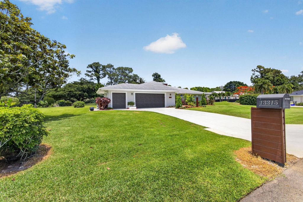 Photo of 13315 Saffron Circle, Palm Beach Gardens, FL 33418 (MLS # B26022867)