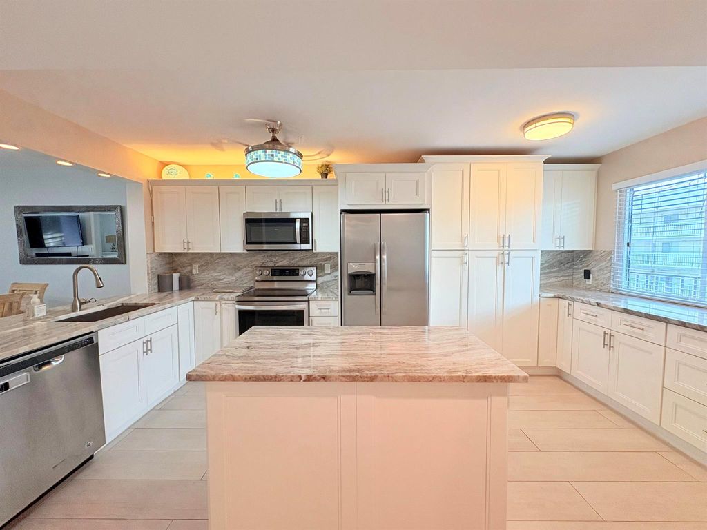 Photo of 3138 Via Poinciana #306, Lake Worth, FL 33467 (MLS # R11142966)