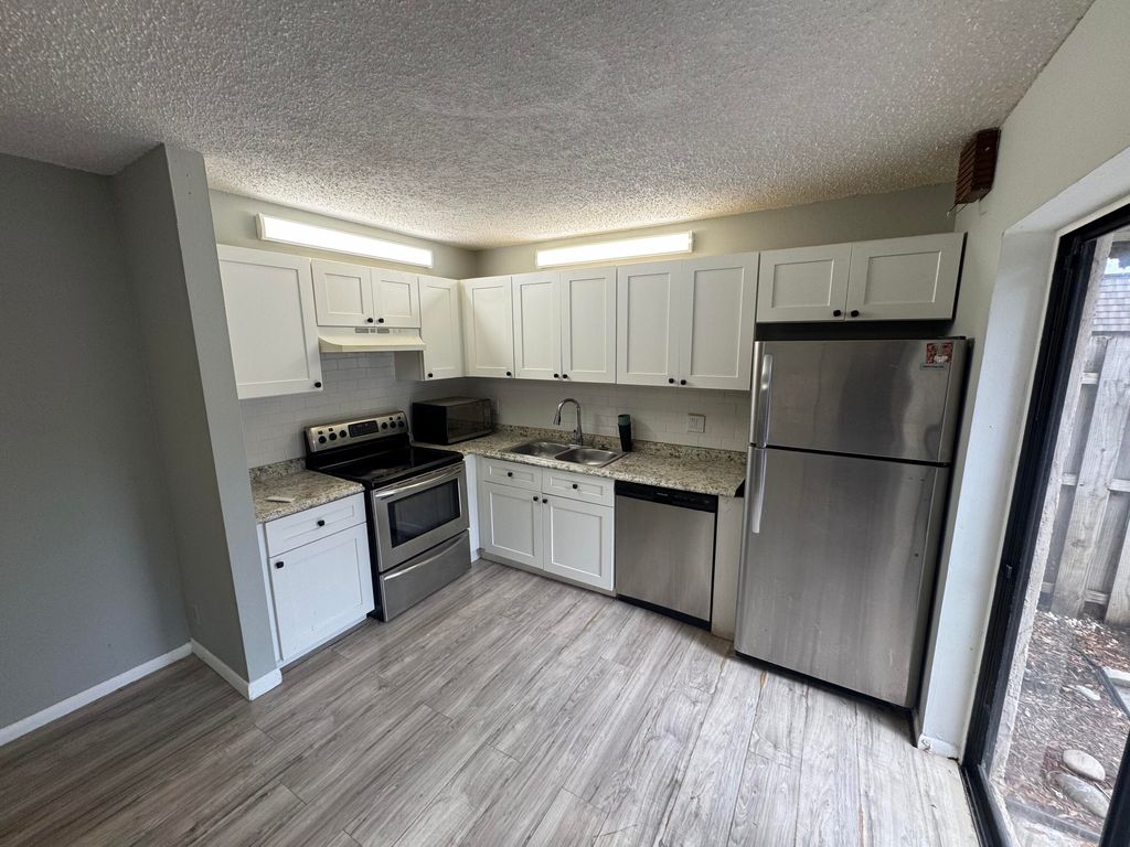 Photo of 1544 Forest Lakes Circle #C, West Palm Beach, FL 33406 (MLS # R11113223)