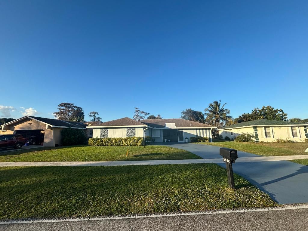 Photo of 2542 S Canterbury Drive S, Riviera Beach, FL 33407 (MLS # R11152350)