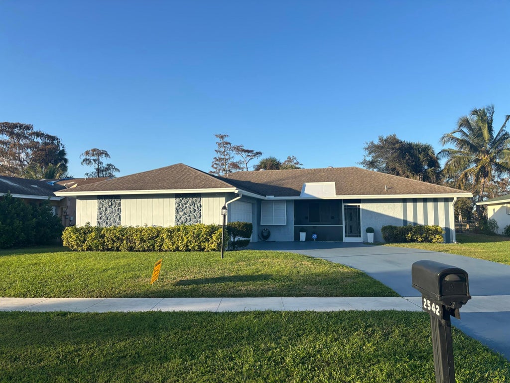 Photo of 2542 S Canterbury Drive S, Riviera Beach, FL 33407 (MLS # R11152350)