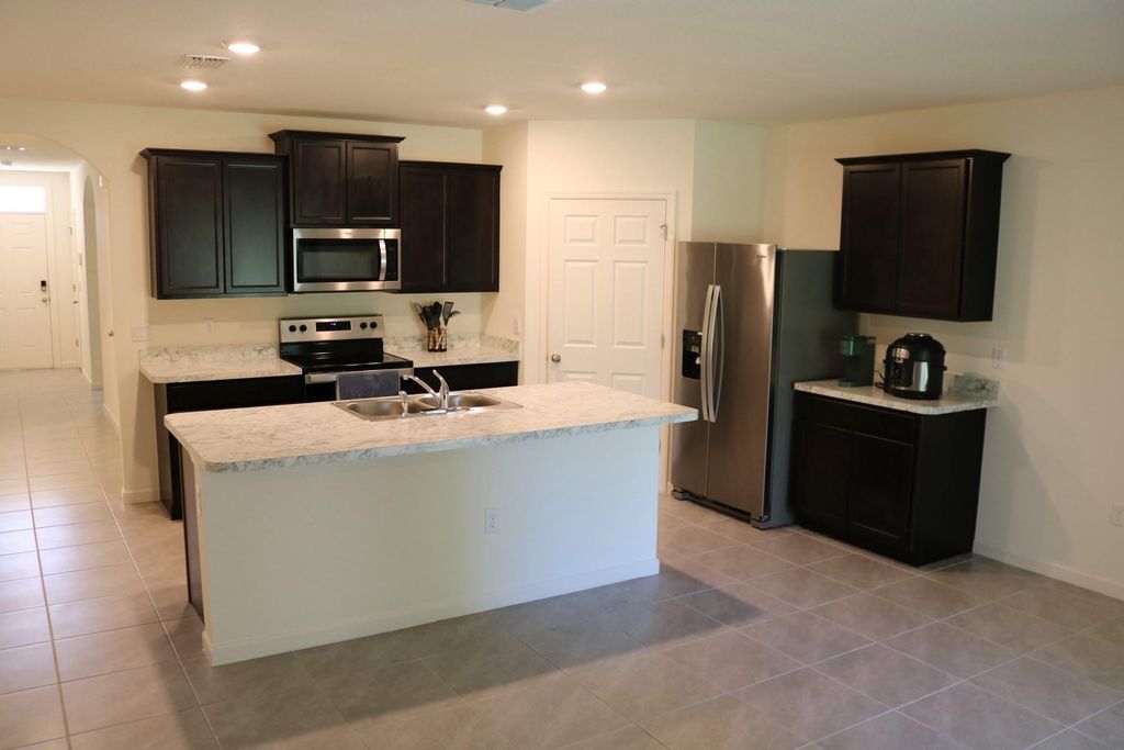 Photo of 651 SW Paar Drive, Port Saint Lucie, FL 34953 (MLS # F10472571)