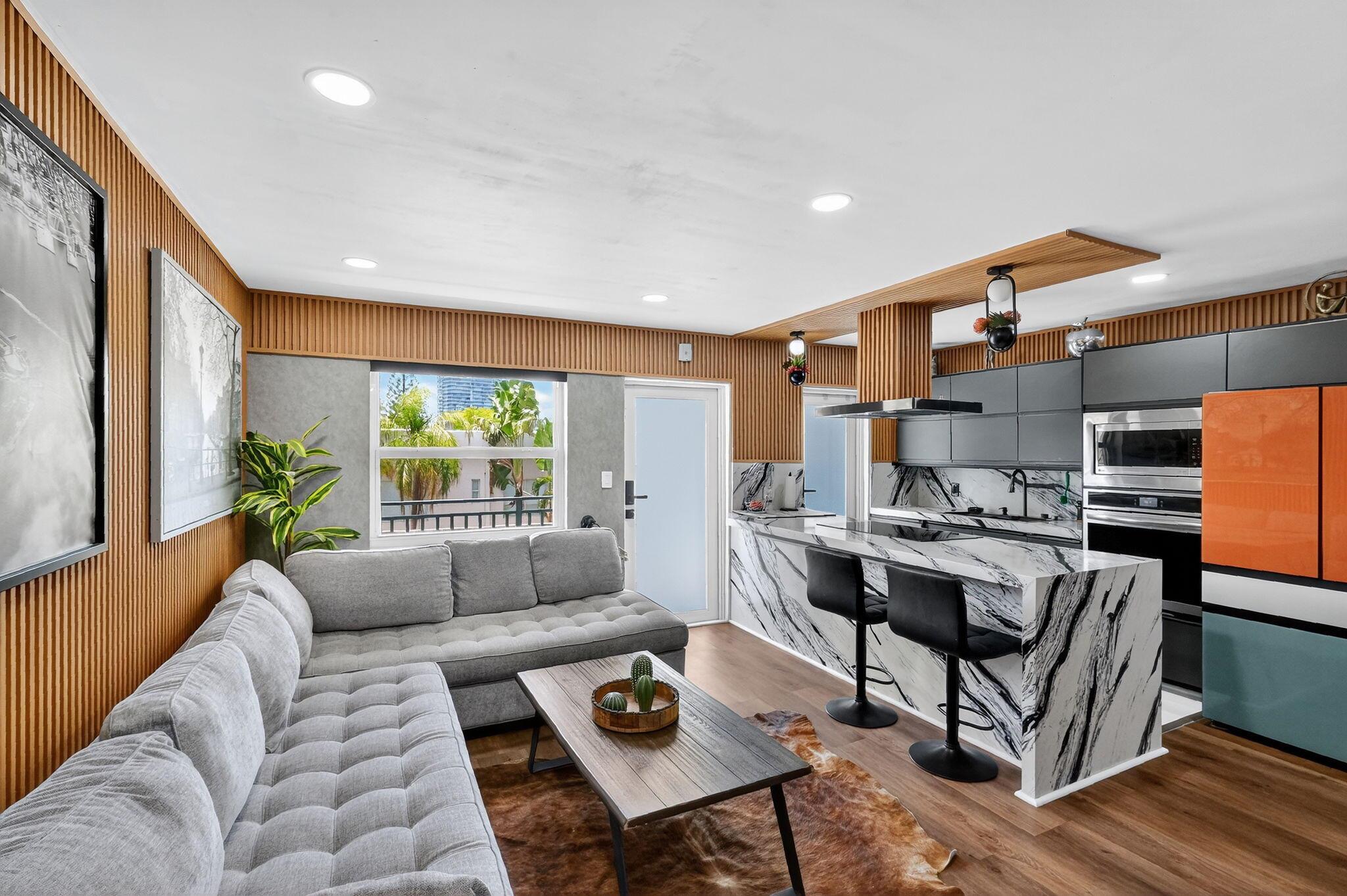 Own a stylish retreat in South of Fifth just 2 blocks from the beach. This fully upgraded unit blends quality finishes with smart design in one of Miami Beach's most desirable neighborhoods.Highlights: * Hurricane-impact doors and windows * Covered parking & elevator access * Soundproof insulation & acoustic wood panels * Waterproof, pet-friendly flooring * Crown molding & recessed LED lighting * Custom kitchen with granite counters & high-end appliances * Spa-style bath with Italian tile * In-unit washer/dryer * Smart home system & remote blackout shades * Gated building with shared storage & planned fitness room! Walk to the beach, South Pointe Park, and world-class dining. Perfect as a personal retreat or smart investment offering comfort, convenience, and value