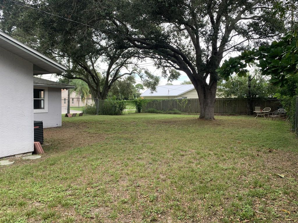 Photo of 2101 SW Idaho Lane, Port Saint Lucie, FL 34953 (MLS # R11016724)